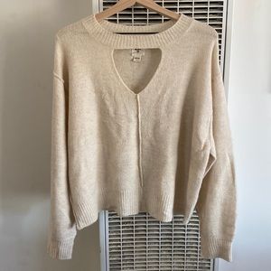 Billabong. Size large. Cream sweater.